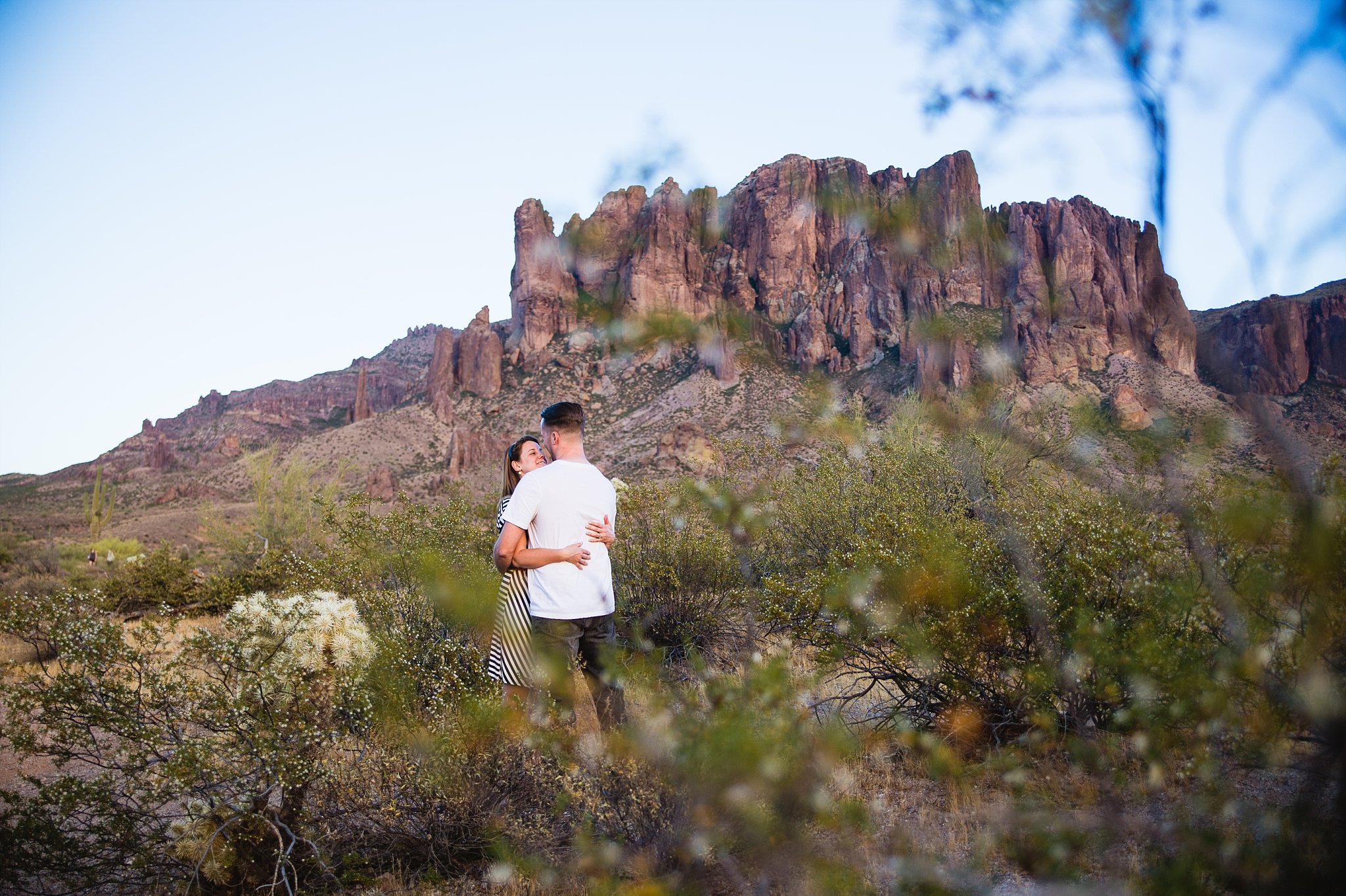 Couple looking at each other at Superstition Mountain Engagement Session Locations