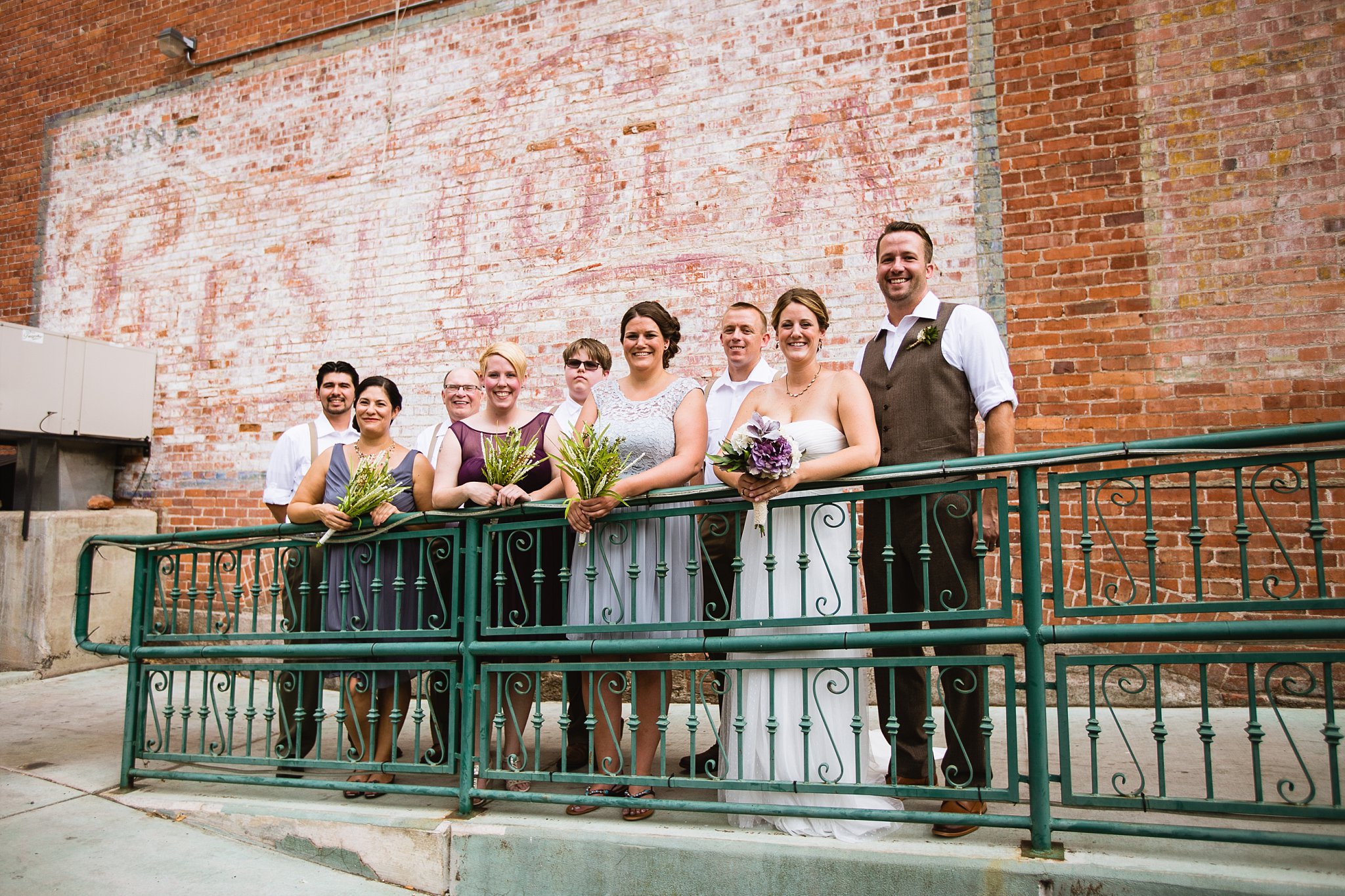Casual Bridal Party in front of vintage Pepsi Cola sign in Bisbee Arizona by PMA Photography