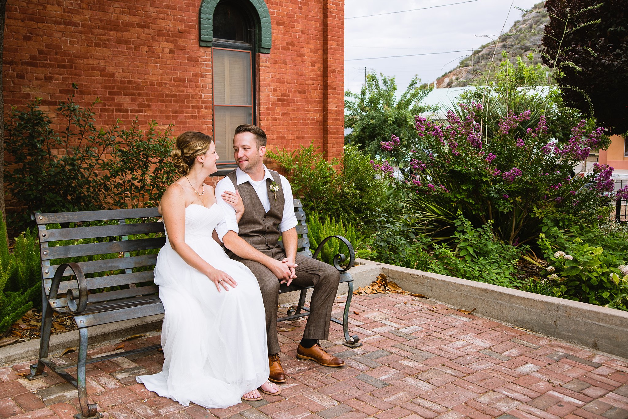 Bride and Groom at a historic garden in Bisbee Arizona by PMA Photography
