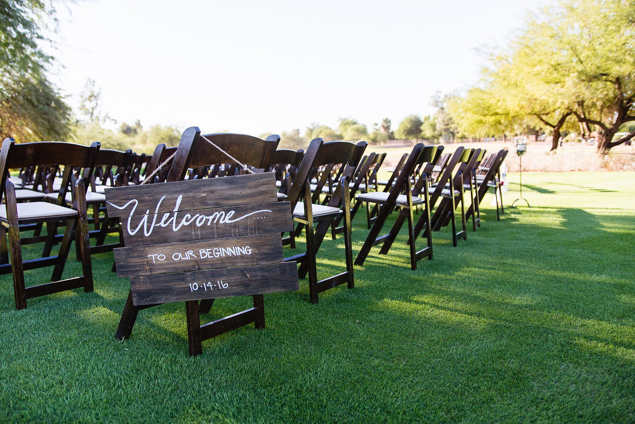 Rustic wedding welcome ceremony sign at Legacy Golf Resort in Phoenix, Arizona by PMA Photography