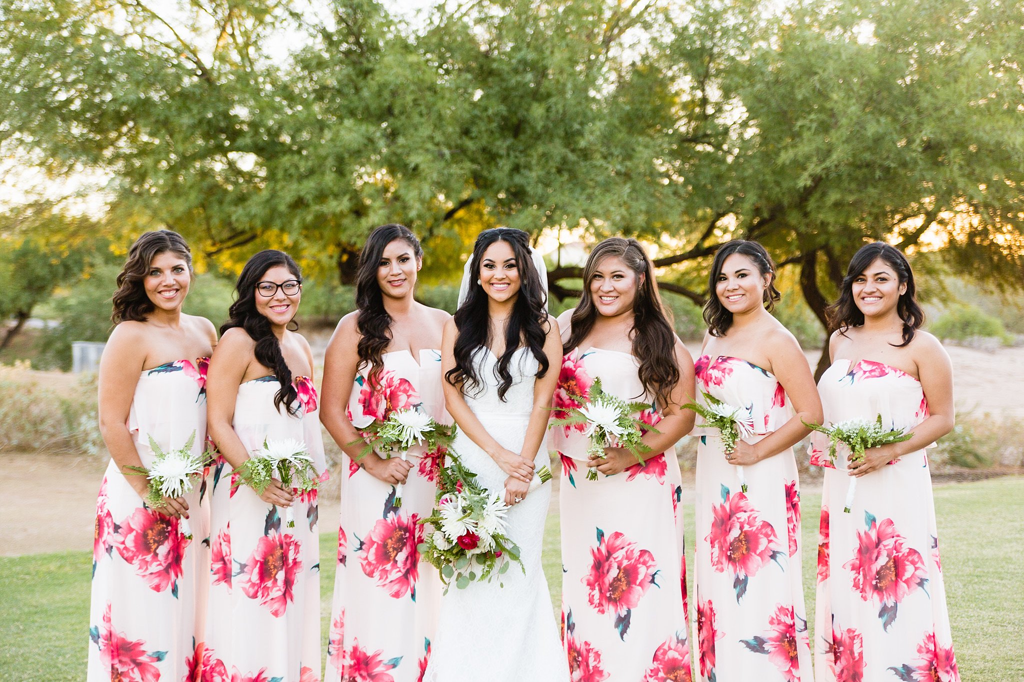 Boho bridal party in pink floral dresses at Legacy Golf Resort in Phoenix, Arizona by PMA Photography