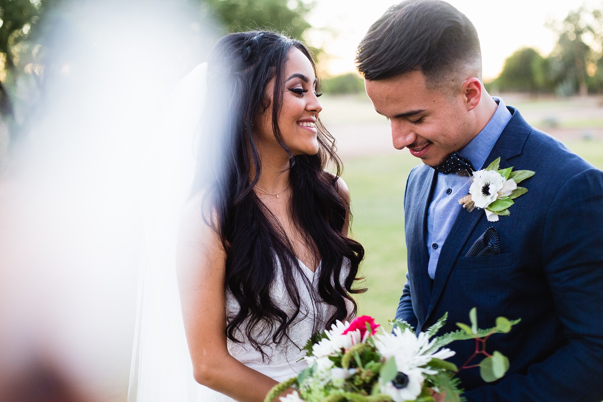 Bride and groom share a moment at Legacy Golf Resort in Phoenix, Arizona by PMA Photography
