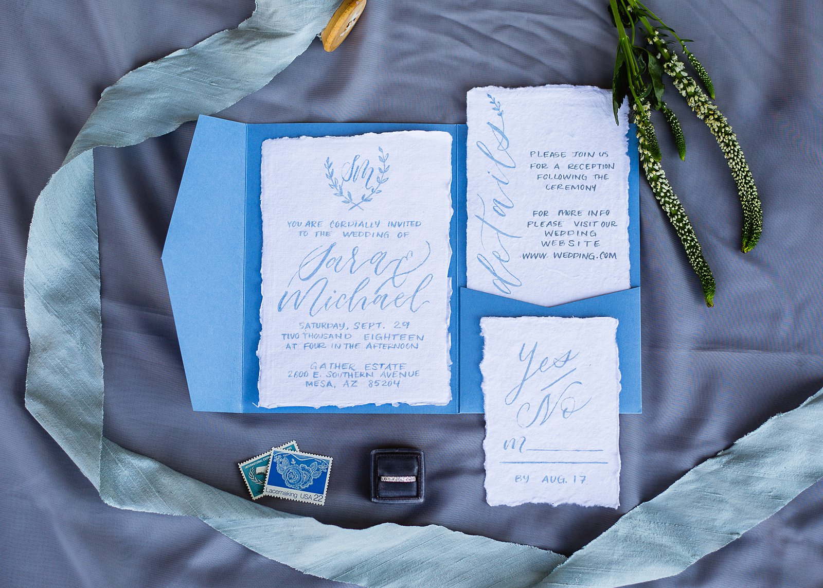 Blue handmade wedding invitation suite by PMA Photography.