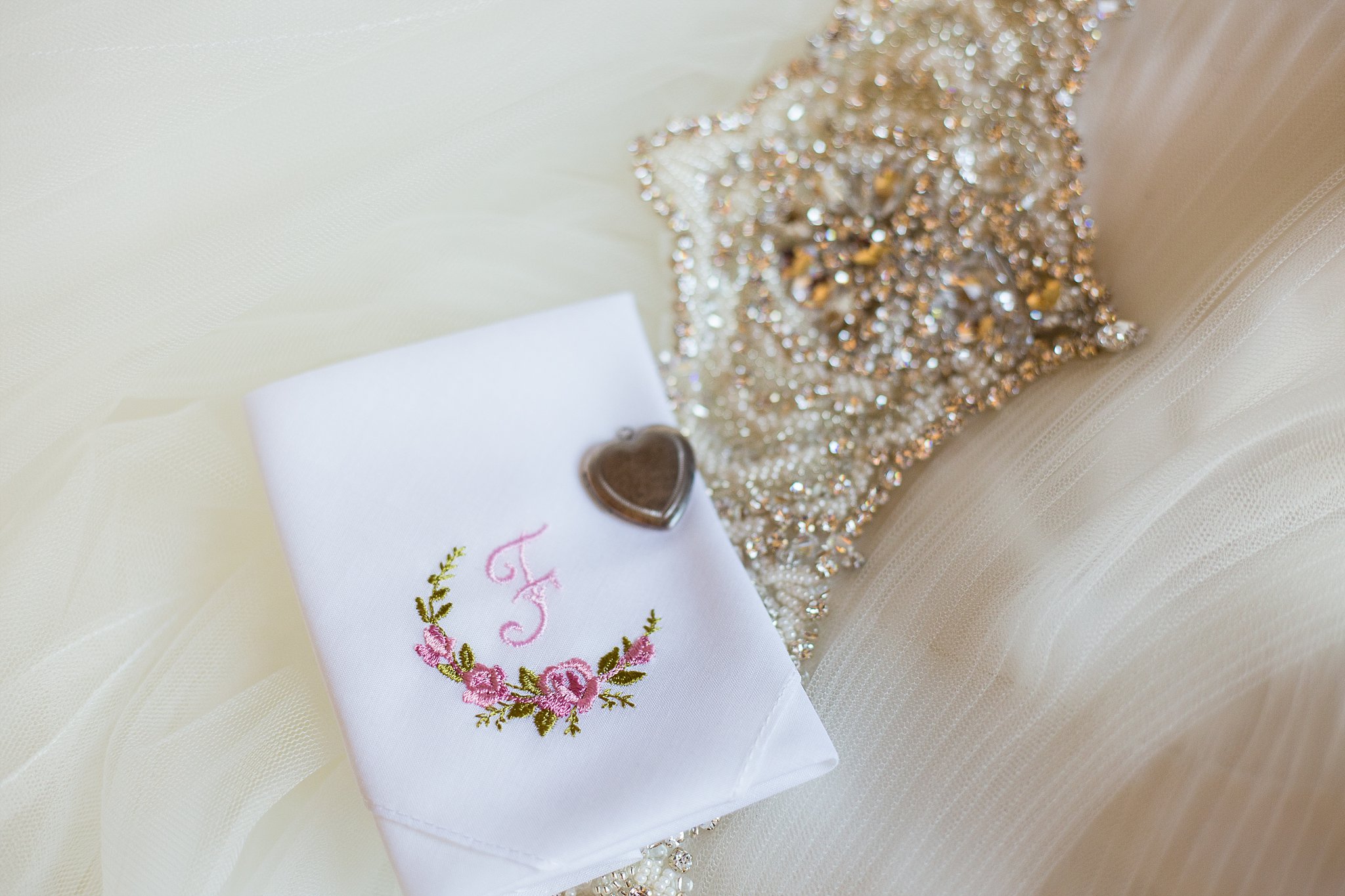 Bride's heirloom handkerchief that she carried on her wedding day by PMA Photography.