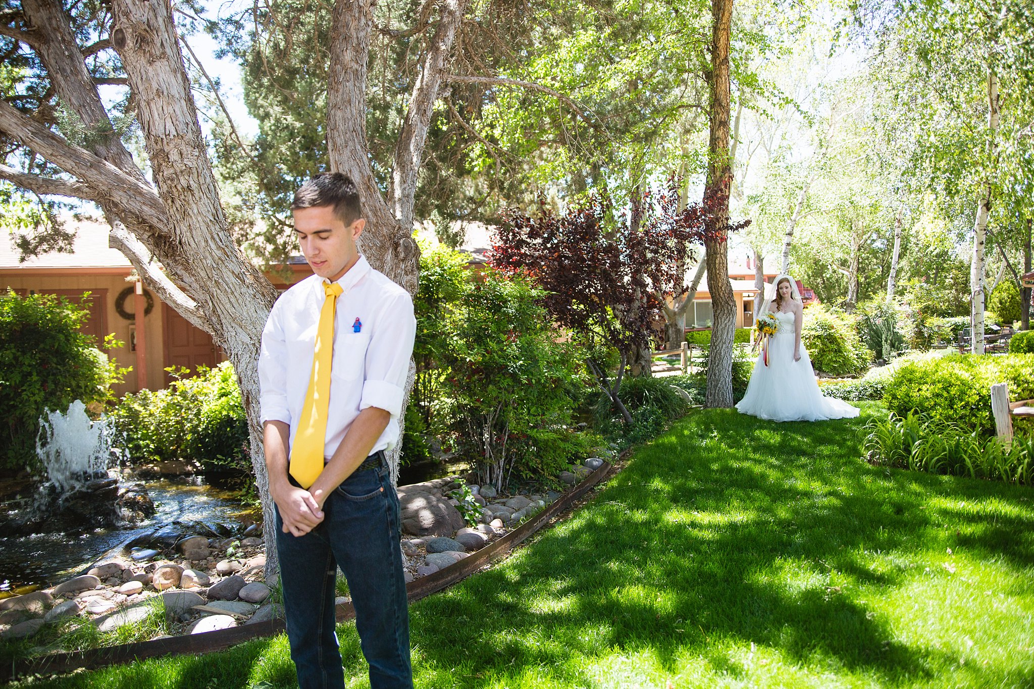Bride and groom getting ready for their first look at Sky Ranch Lodge by Sedona wedding photographer PMA Photography.