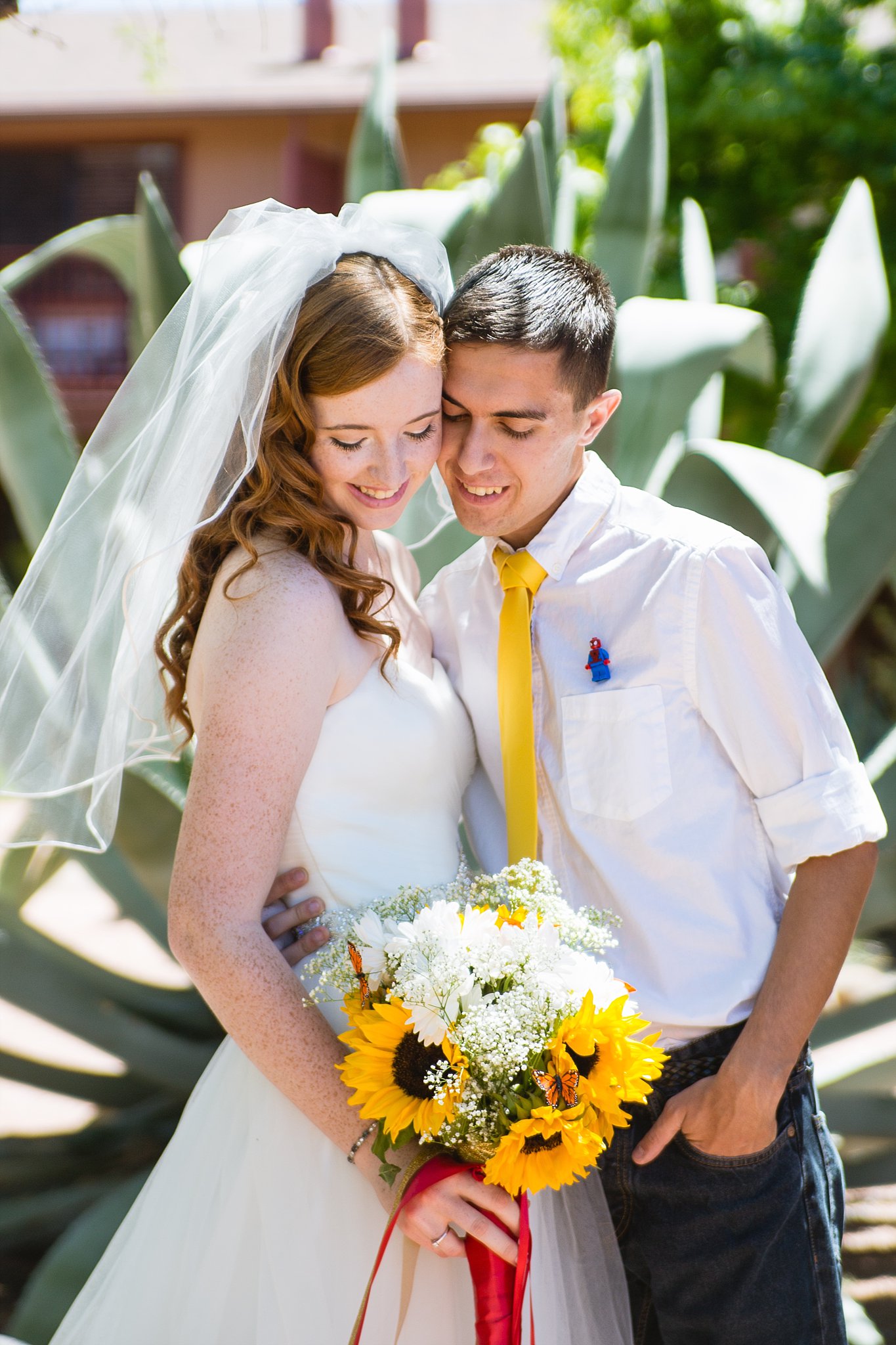 Bride and groom together at their Sky Ranch Lodge wedding by Sedona wedding photographer PMA Photography.