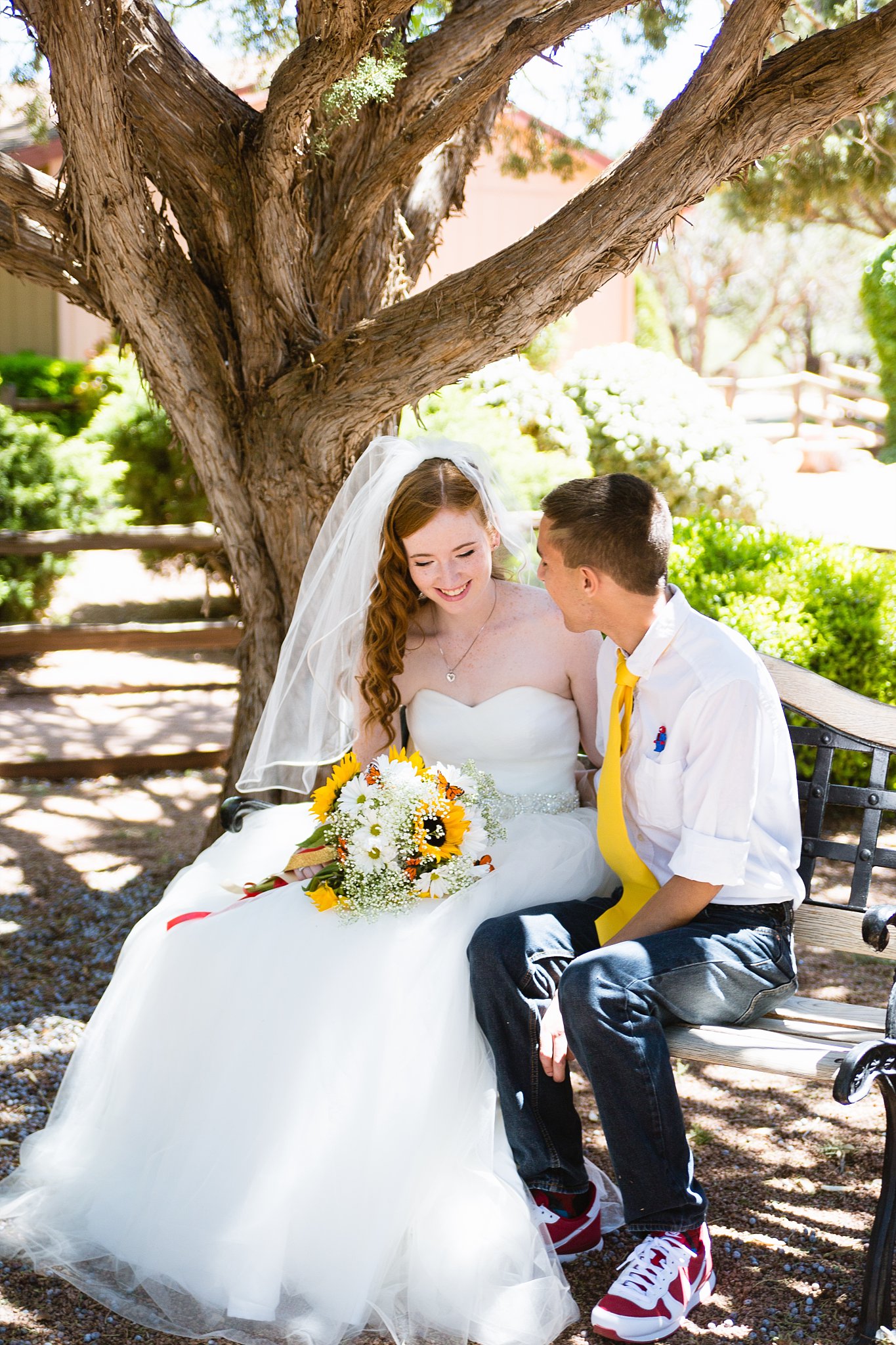 Bride and groom together at their Sky Ranch Lodge wedding by Sedona wedding photographer PMA Photography.