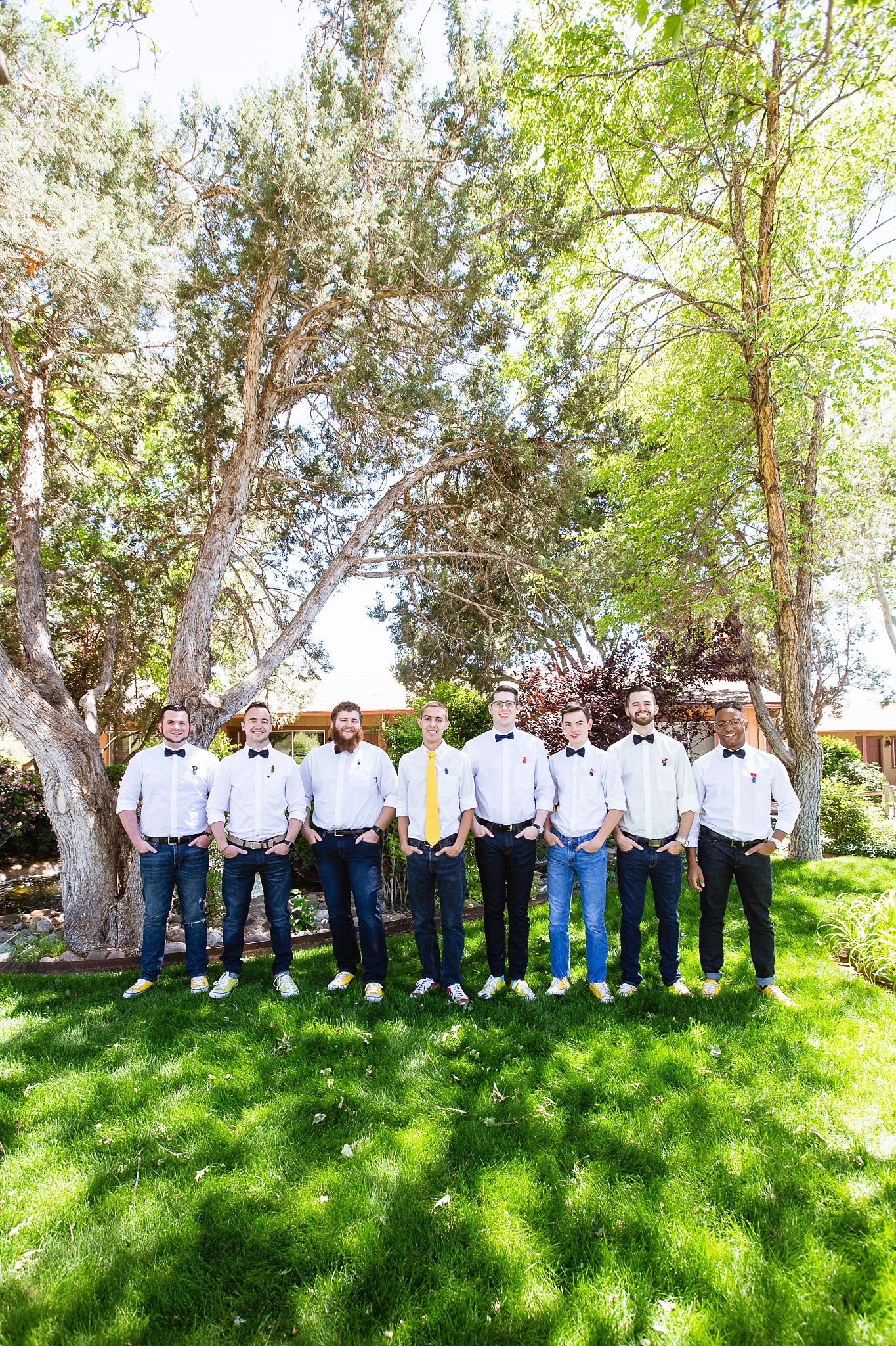 Groom and groomsmen together at a Sky Ranch Lodge wedding by Arizona wedding photographer PMA Photography.