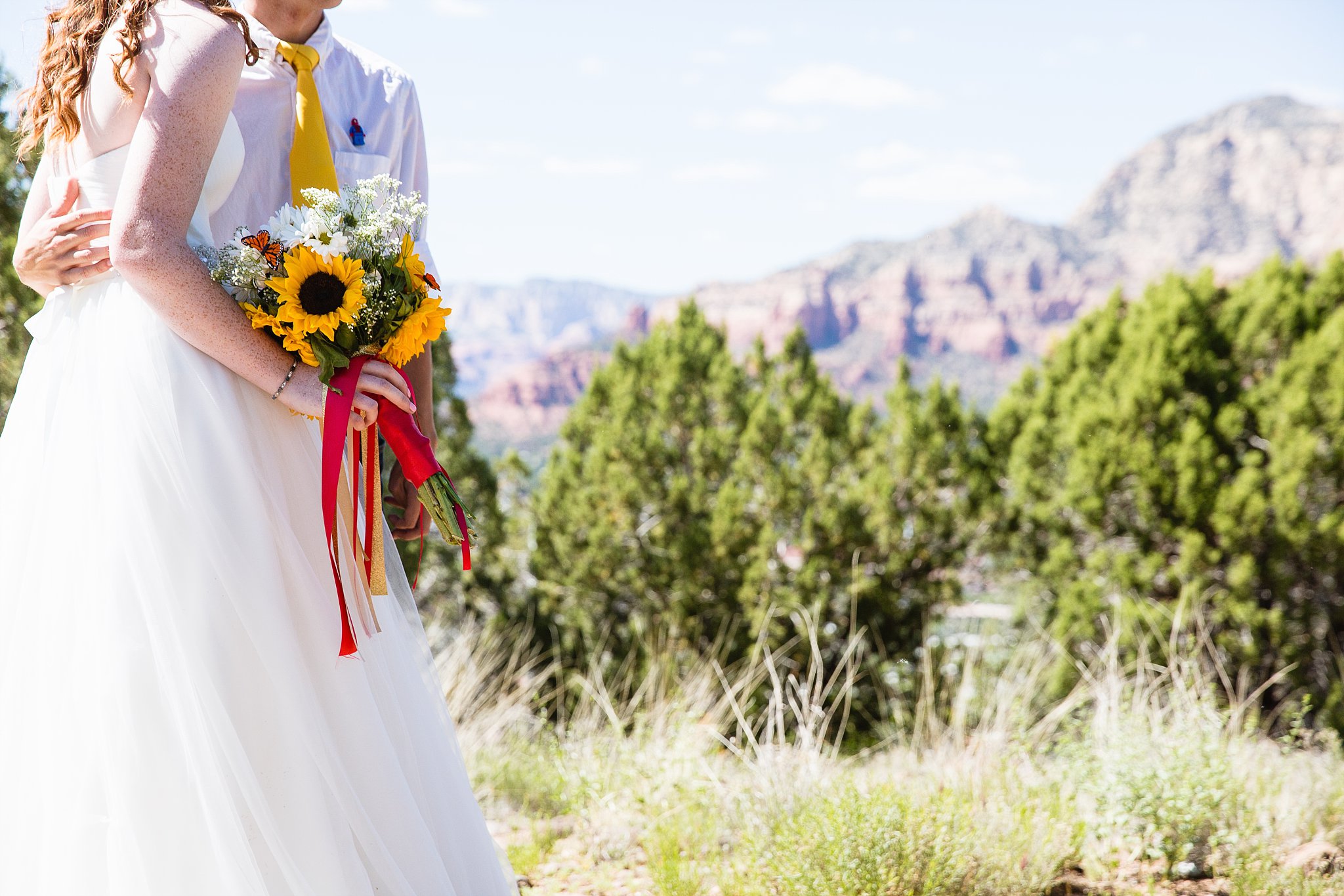 Bride and groom wedding day outfit details by Sedona wedding photographer PMA Photography.