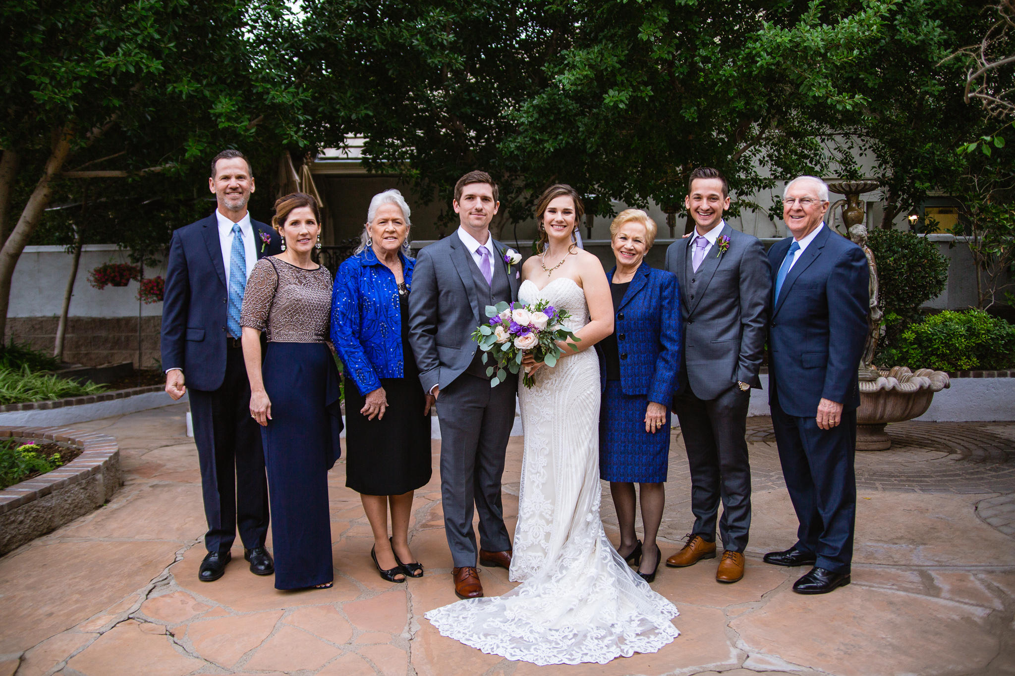 A wedding day family portrait grouping by PMA Photography. 