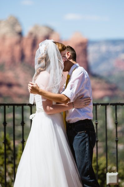 Bride and groom just after their first kiss at their Sedona wedding by PMA Photography.