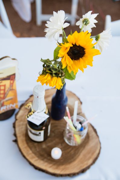 Simple DIY sunflower centerpieces by PMA Photography.