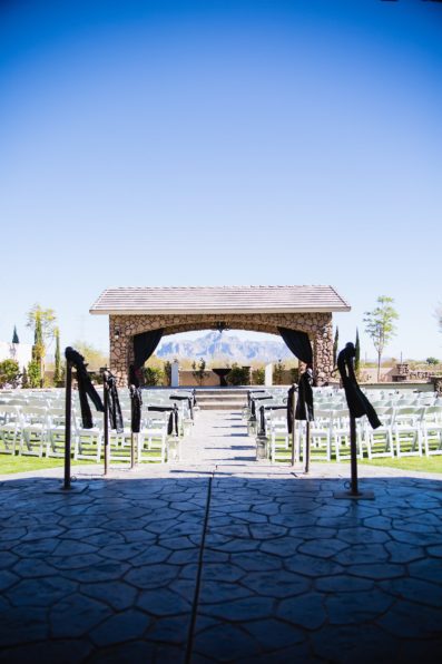 Superstition Manor wedding ceremony views of the Superstition Mountains by Arizona wedding photographers PMA Photography.