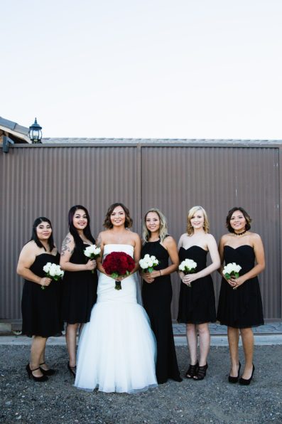Classic black and red bridesmaids by Arizona wedding photographer PMA Photography.