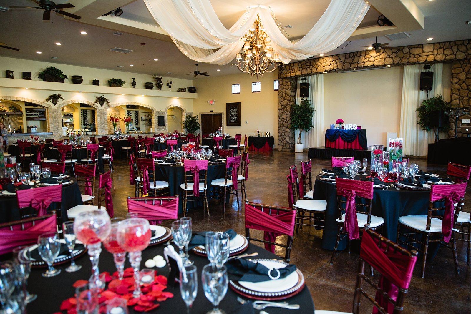 Classic black and red reception details at the Superstition Manor by PMA Photography.