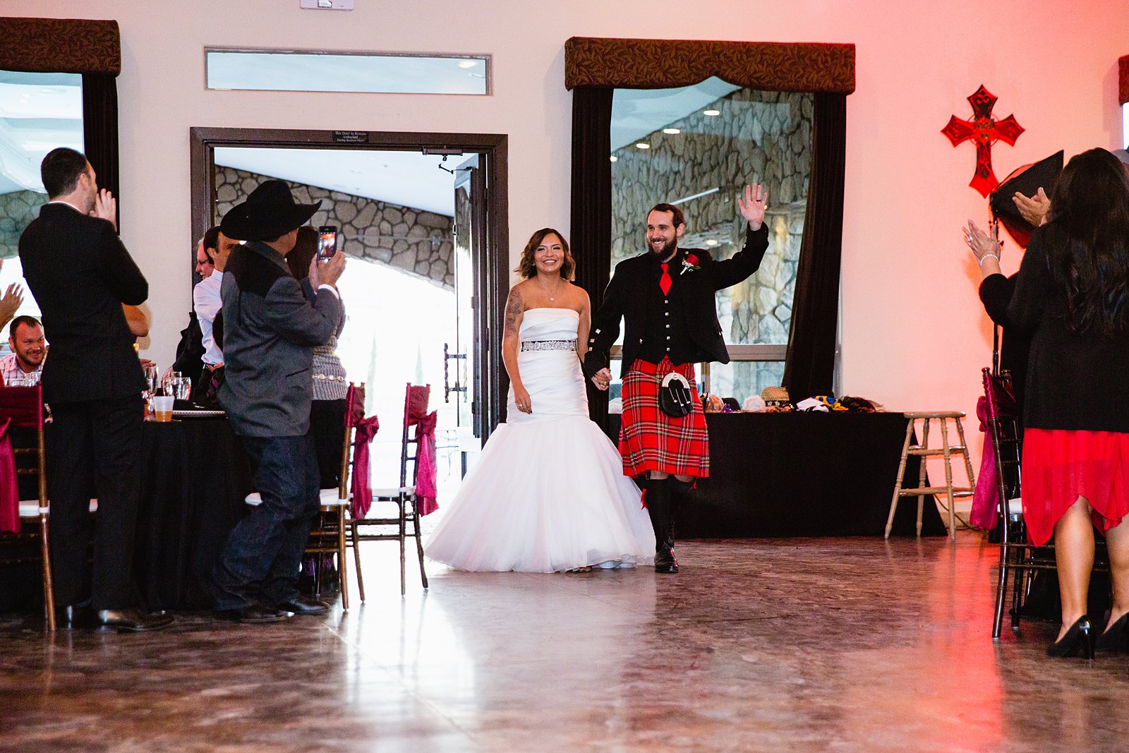 Bride and groom's grand entrance at Superstition Manor by PMA Photography.