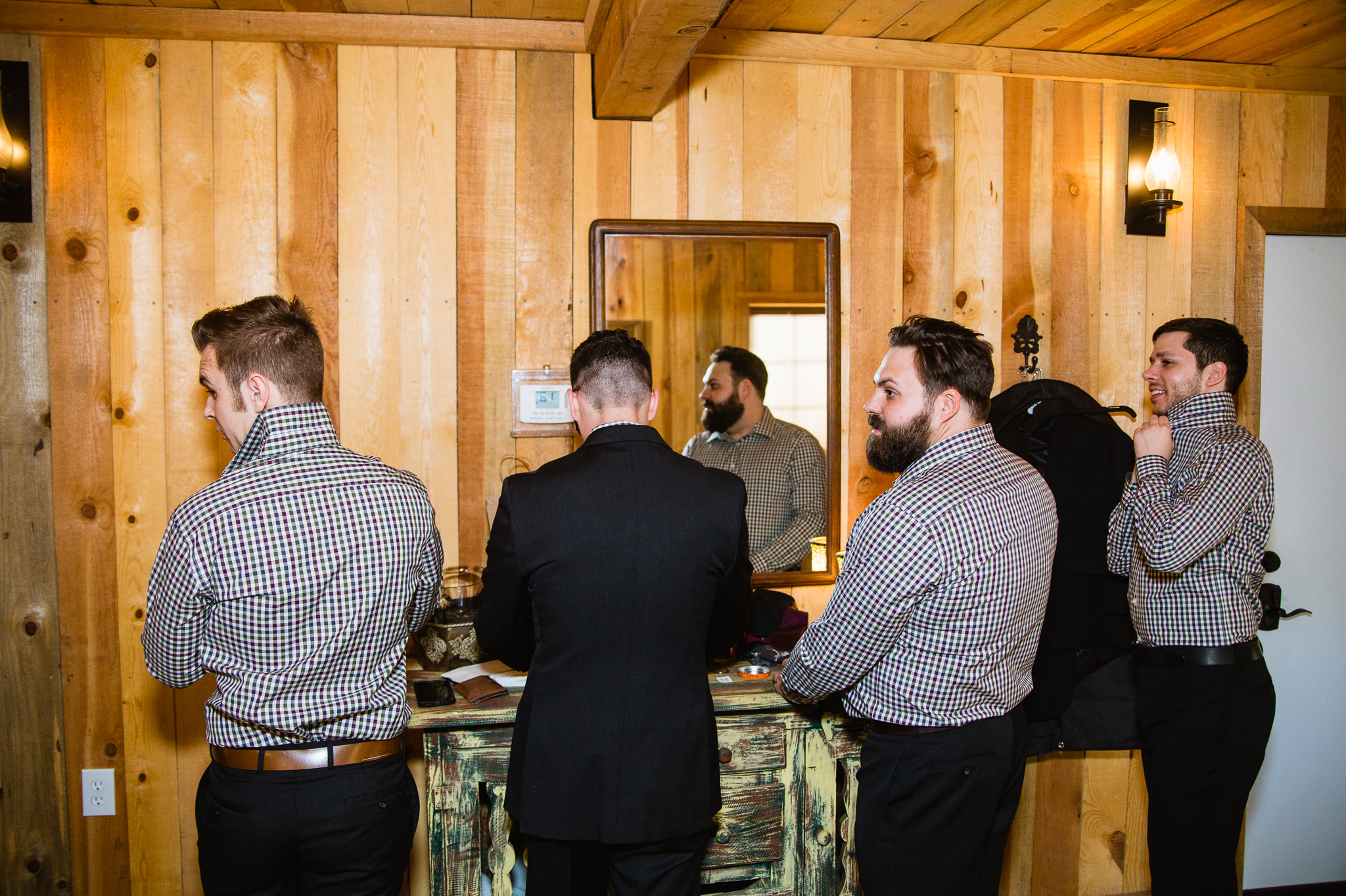Have the groomsmen in their shirts and pants before the photographer arrives.