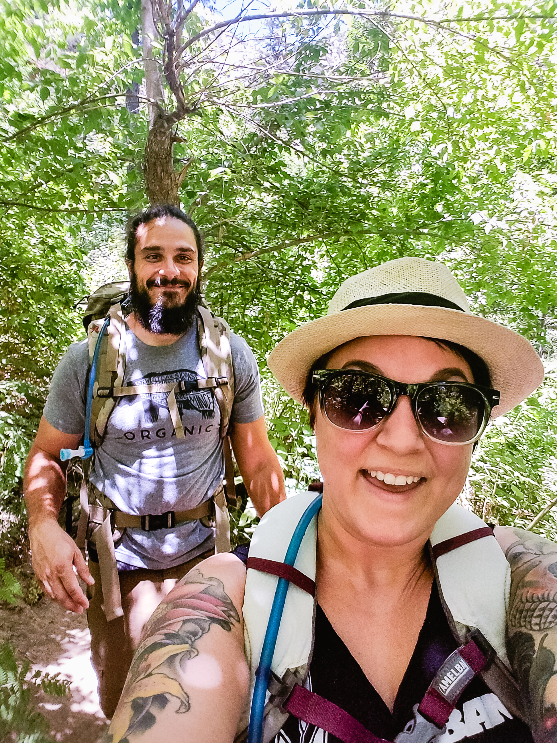 Selfie of Amber and Josh hiking Oak Creek Trail.