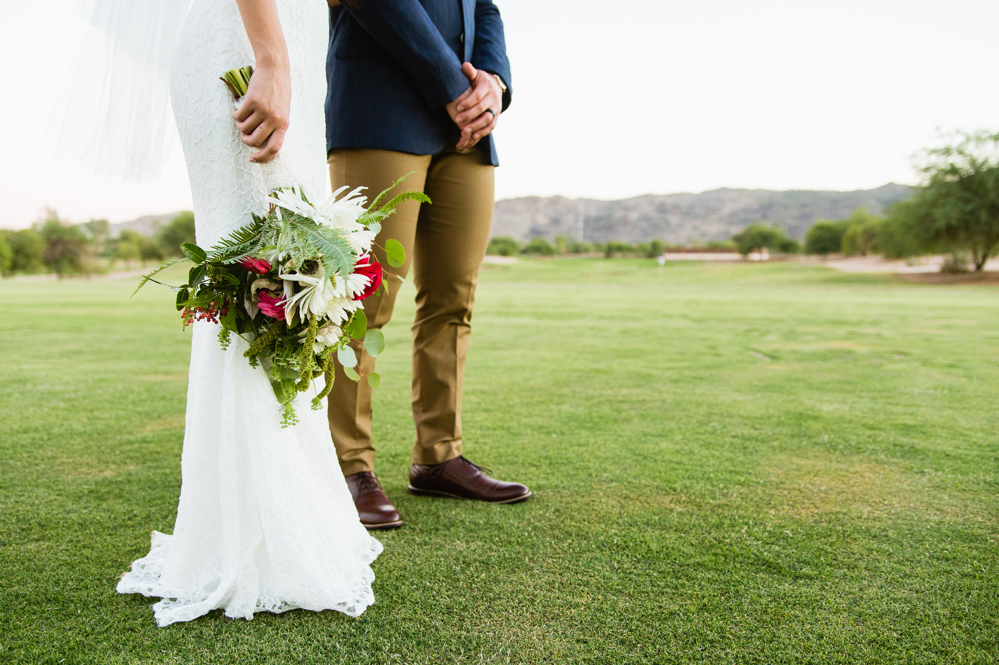 Boho Bride and Groom with bouquet