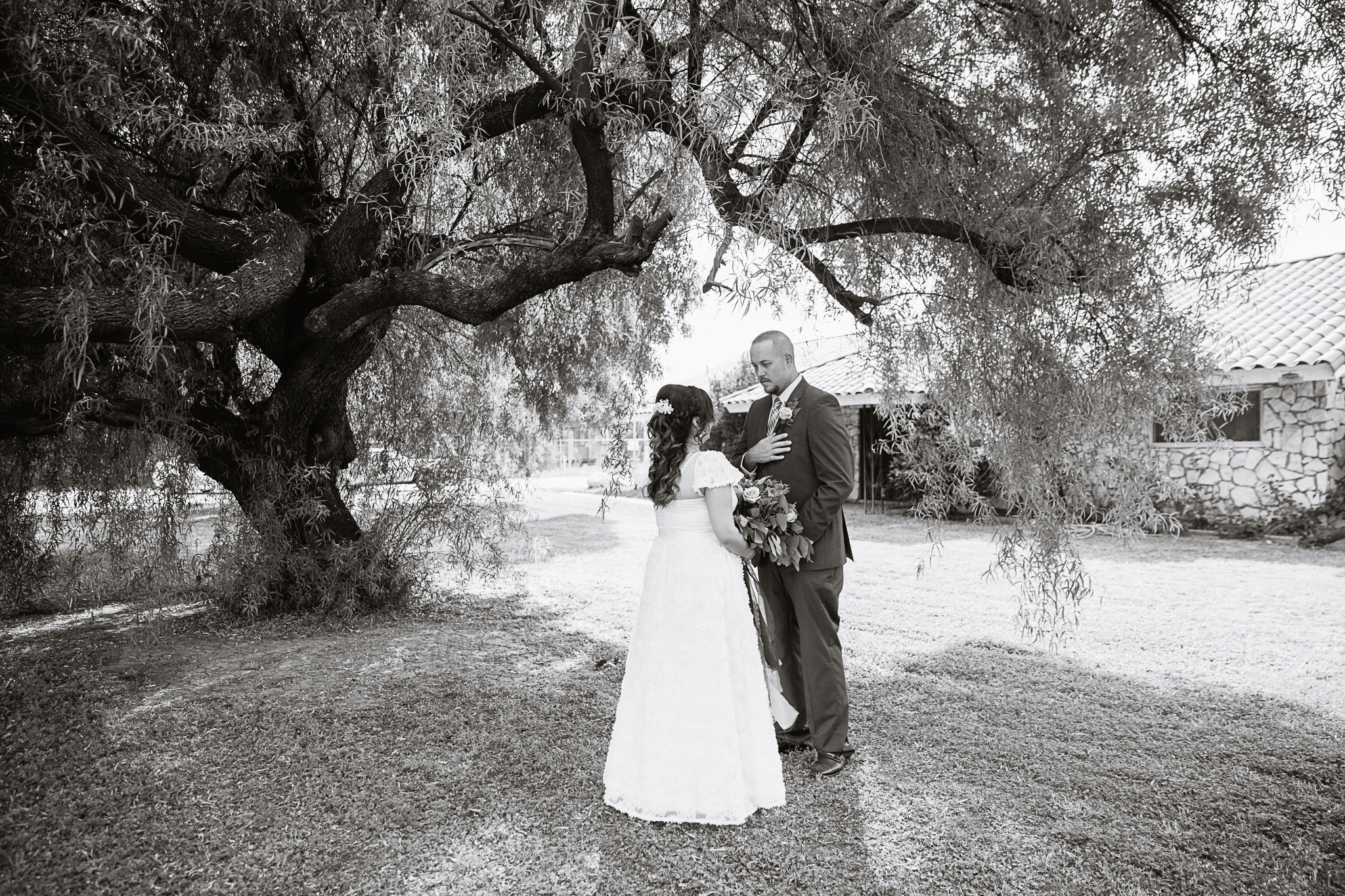 Bride and groom's first look on their wedding day by Arizona wedding photographer PMA Photography.