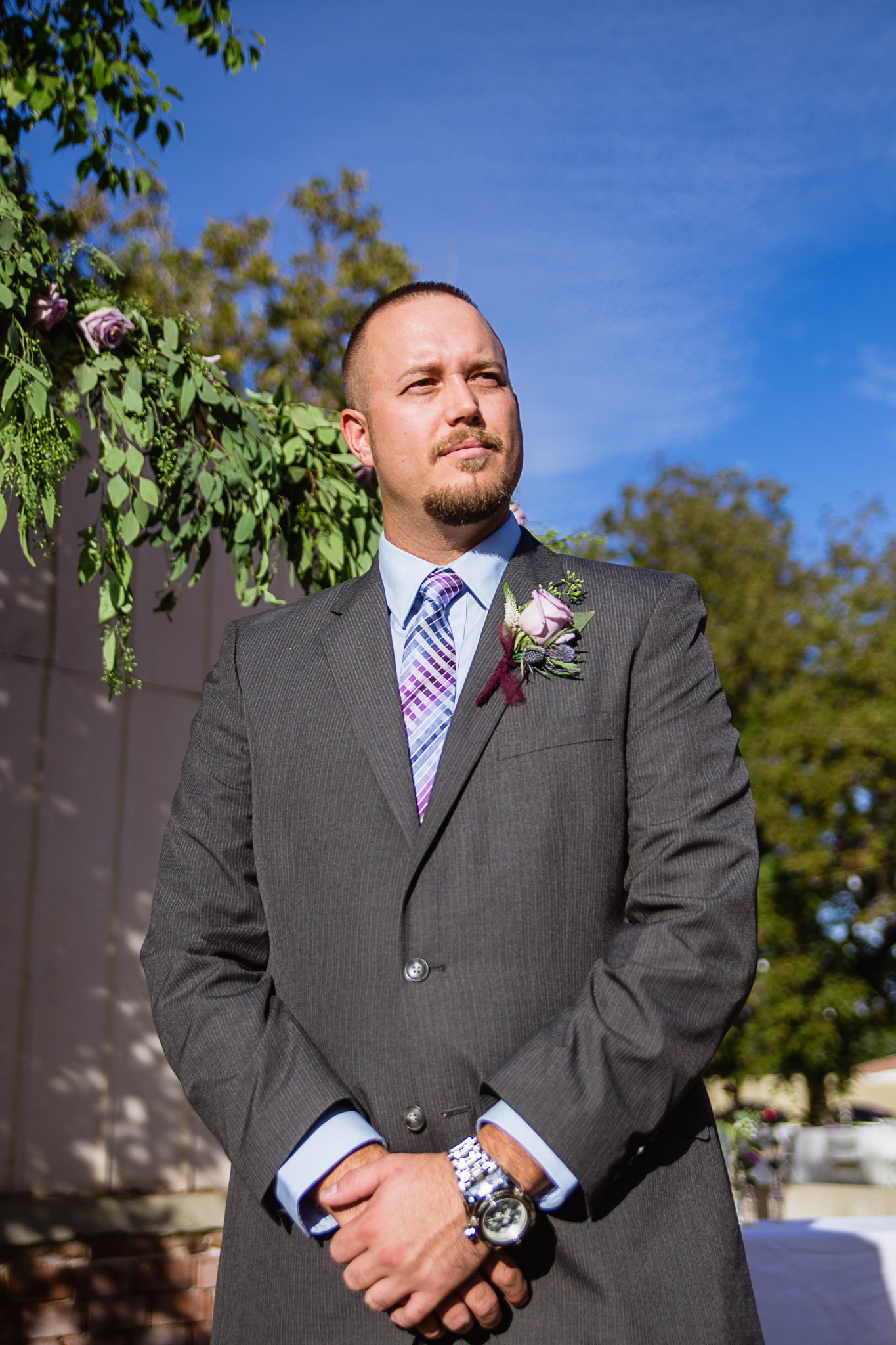 Groom watching his bride walk down the aisle by PMA Photography.