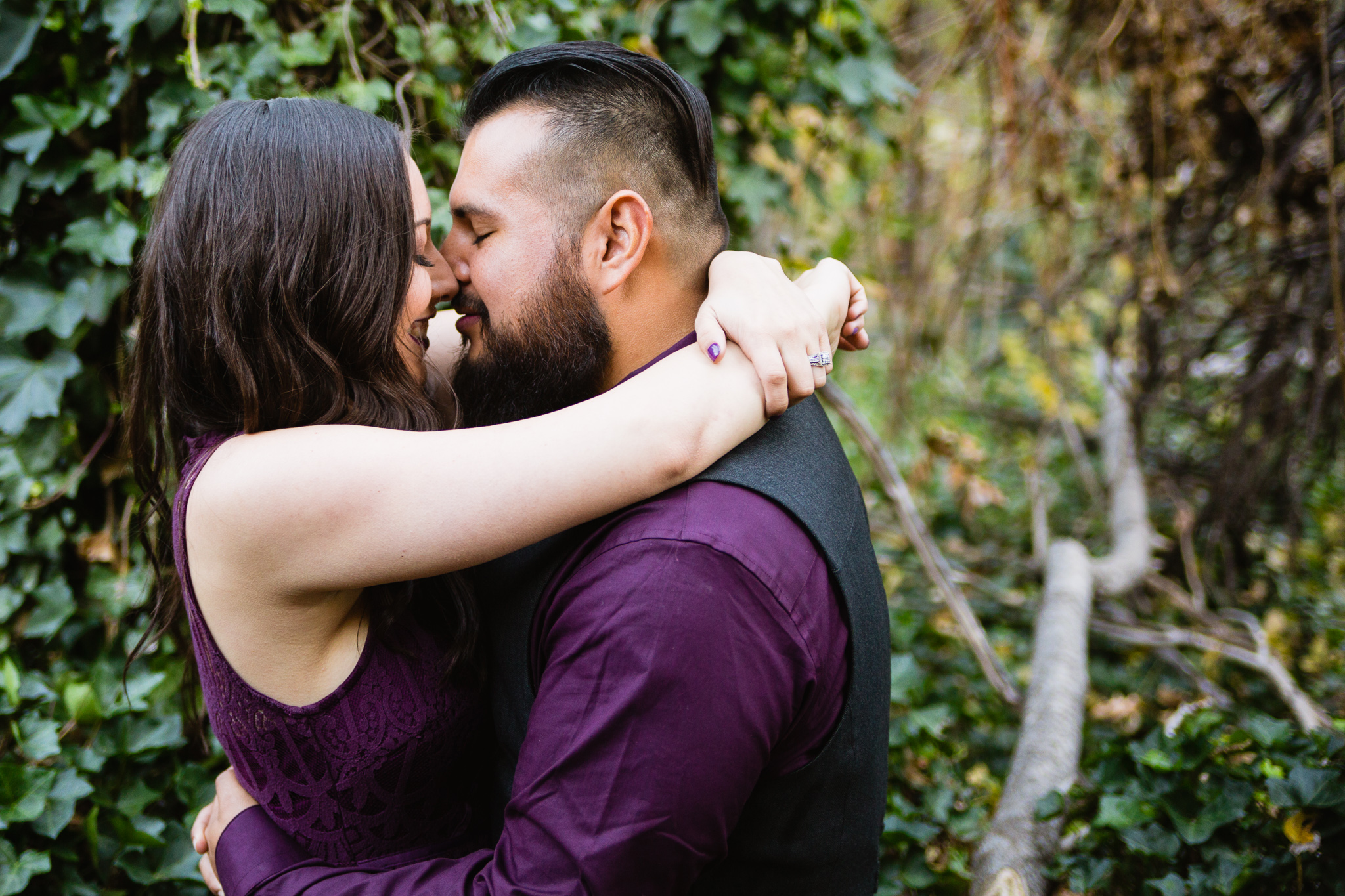Couple Kissing at West Fork Oak Creek Trail in Sedona Arizona Engagement Session Location