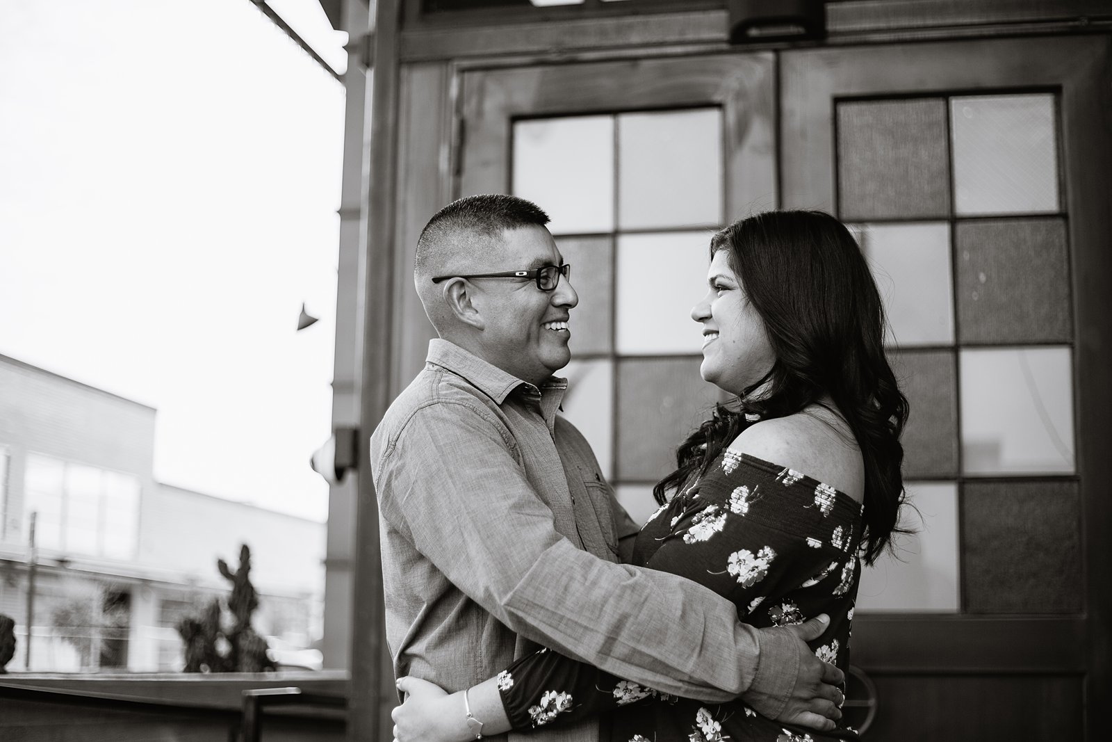 Black and white image of couple during their Gilbert engagement session by wedding photographers PMA Photography.