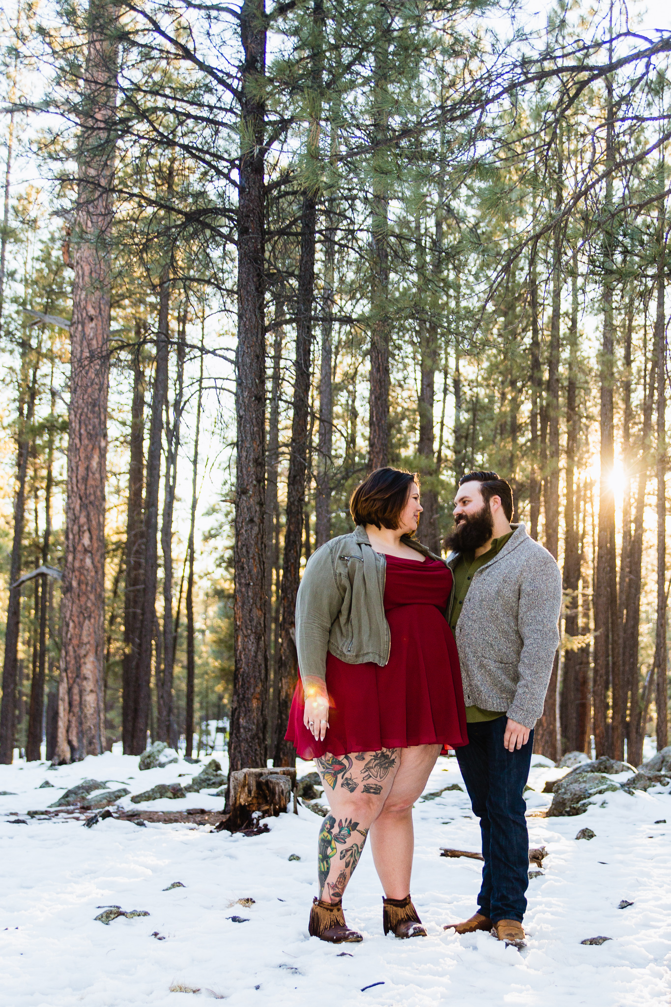 Couple looking at each other at Flagstaff Arizona Engagement Session Location.