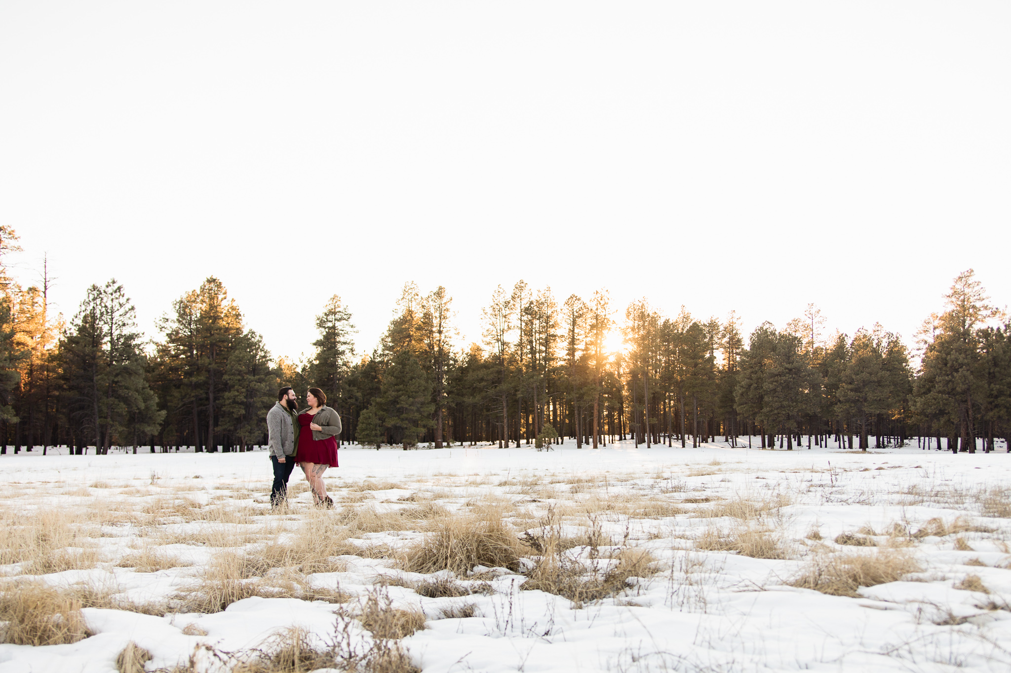 Couple looking at each other at Flagstaff Arizona Engagement Session Locations.