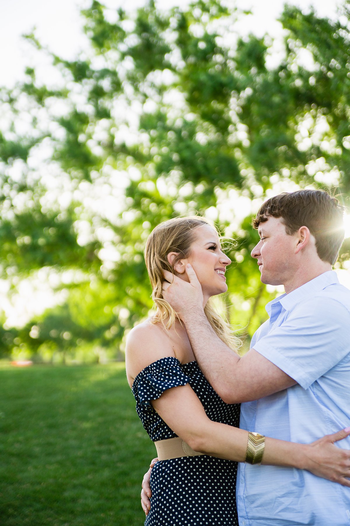 Couple looking at each other during their engagement session by PMA Photography.