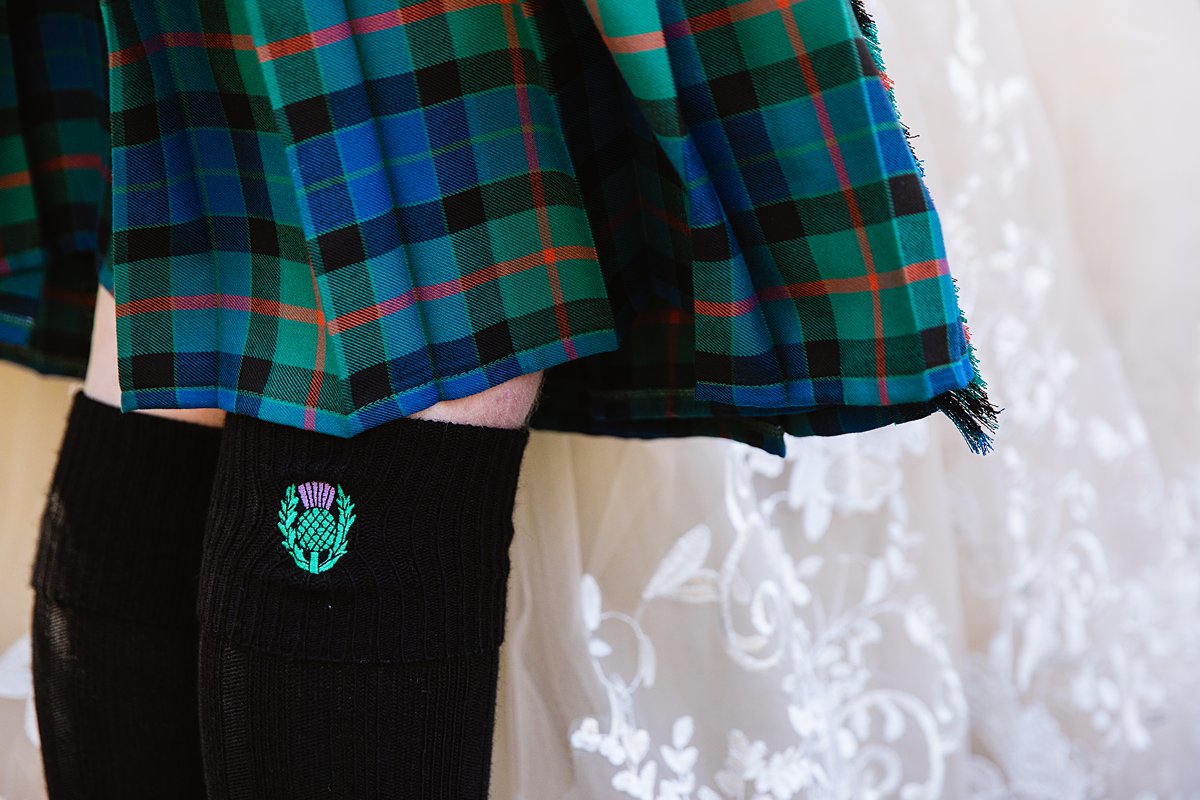 Detail image of groom's kilt by PMA Photography.