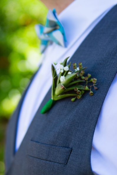 Simple succulent DIY wedding boutonniere. Image by PMA Photography.