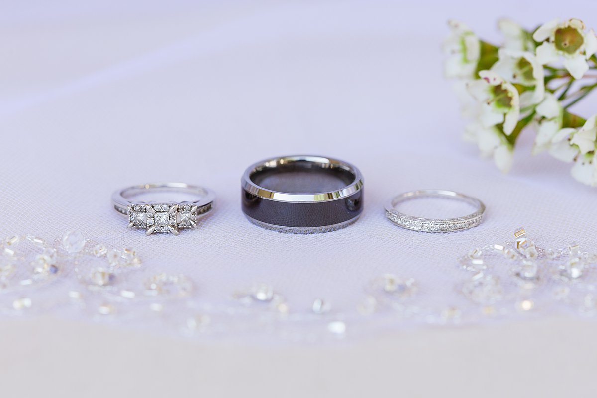 Black and white gold wedding rings by PMA Photography.