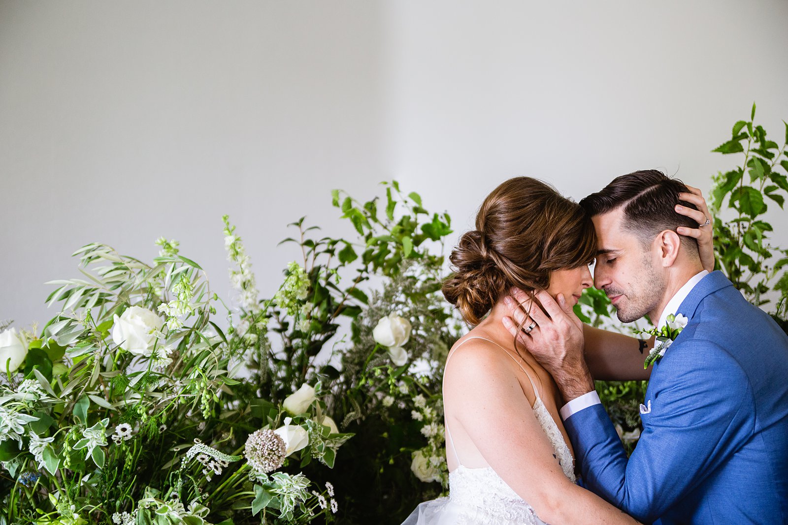 Bride and groom share an intimate moment during their Gather Estate wedding by Phoenix engagement photographer PMA Photography.