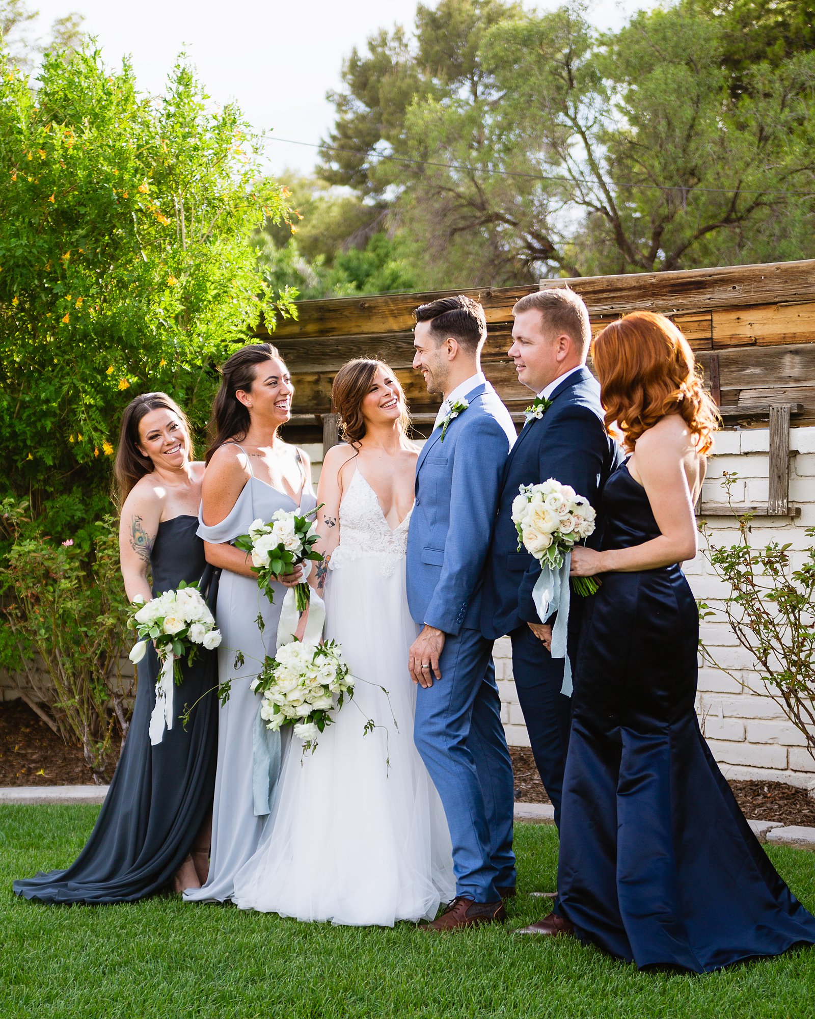 Bridal party together at a Gather Estate wedding by Arizona wedding photographer PMA Photography.