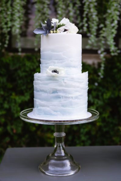 Unique layered grey and white wedding cake by Arizona wedding photographer PMA Photography.