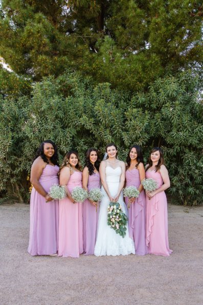 Bride and bridesmaids together at a Schnepf Farms wedding by Arizona wedding photographer PMA Photography.