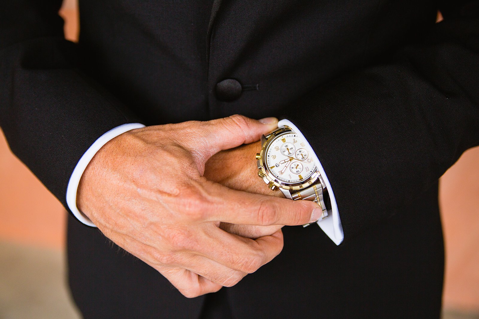 Groom's wedding day details of his watch by PMA Photography.