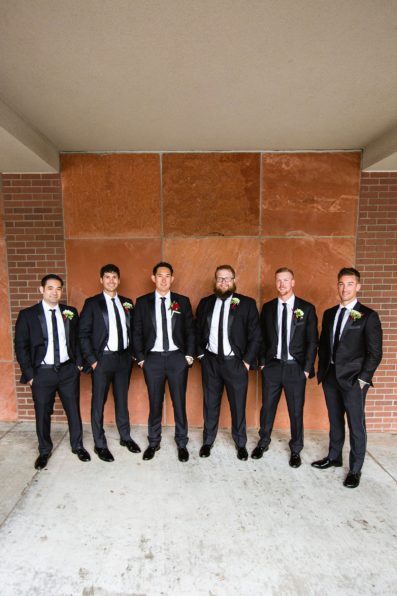 Groom and groomsmen together at a downtown Flagstaff wedding by Arizona wedding photographer PMA Photography.