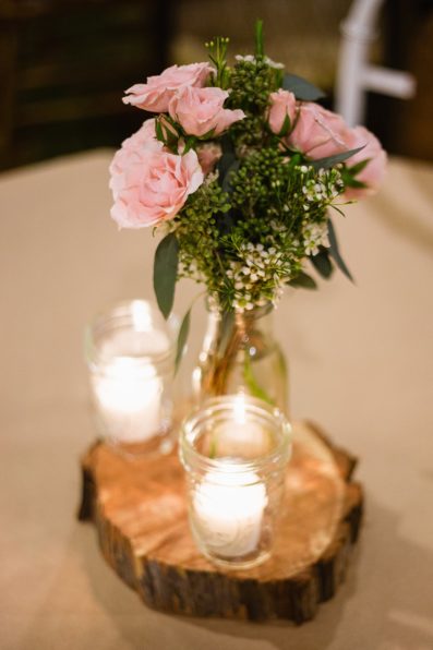 Simple rustic centerpieces at Toasted Owl wedding reception by Flagstaff wedding photographer PMA Photography.