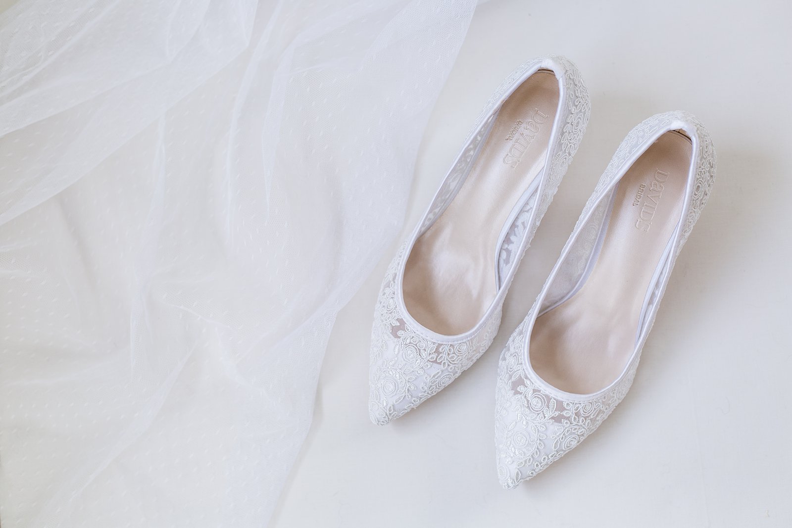 Brides's wedding day details of vintage inspired wedding shoes by PMA Photography.