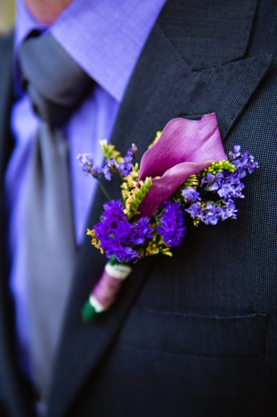 Groom's purple boutonniere by PMA Photography.