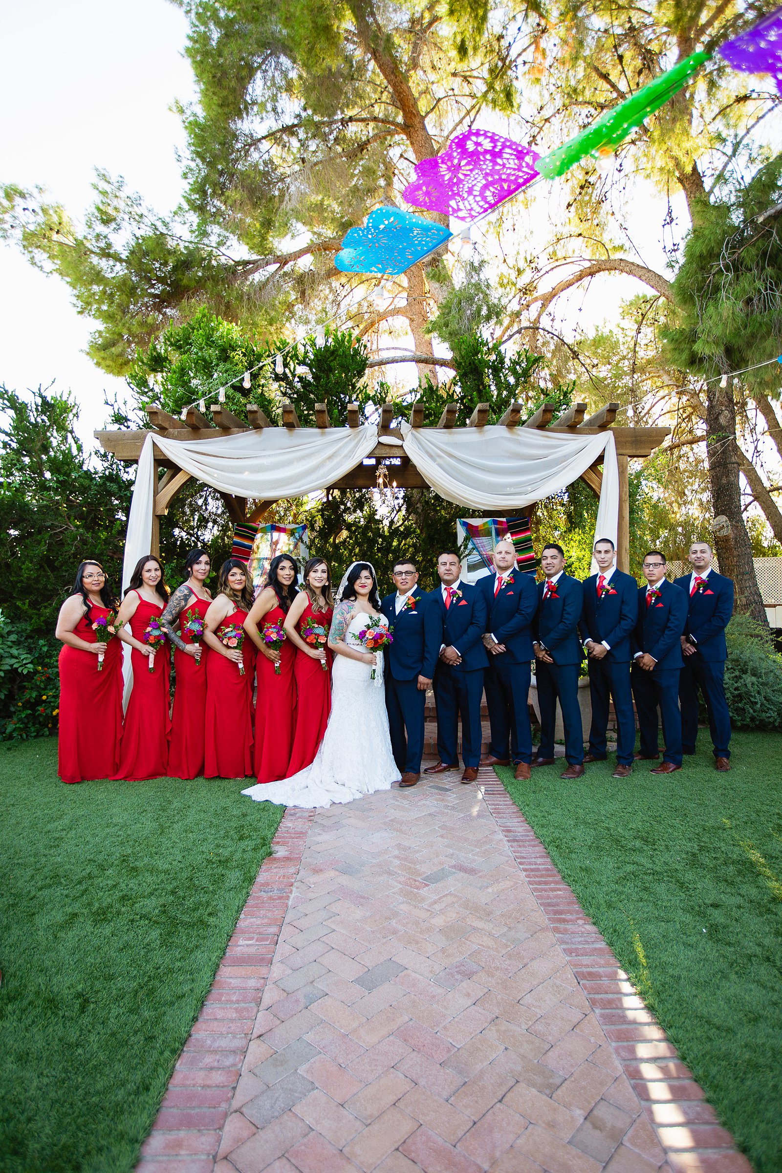 Bridal party together at a The Farmhouse at Schnepf Farms wedding by Arizona wedding photographer PMA Photography.