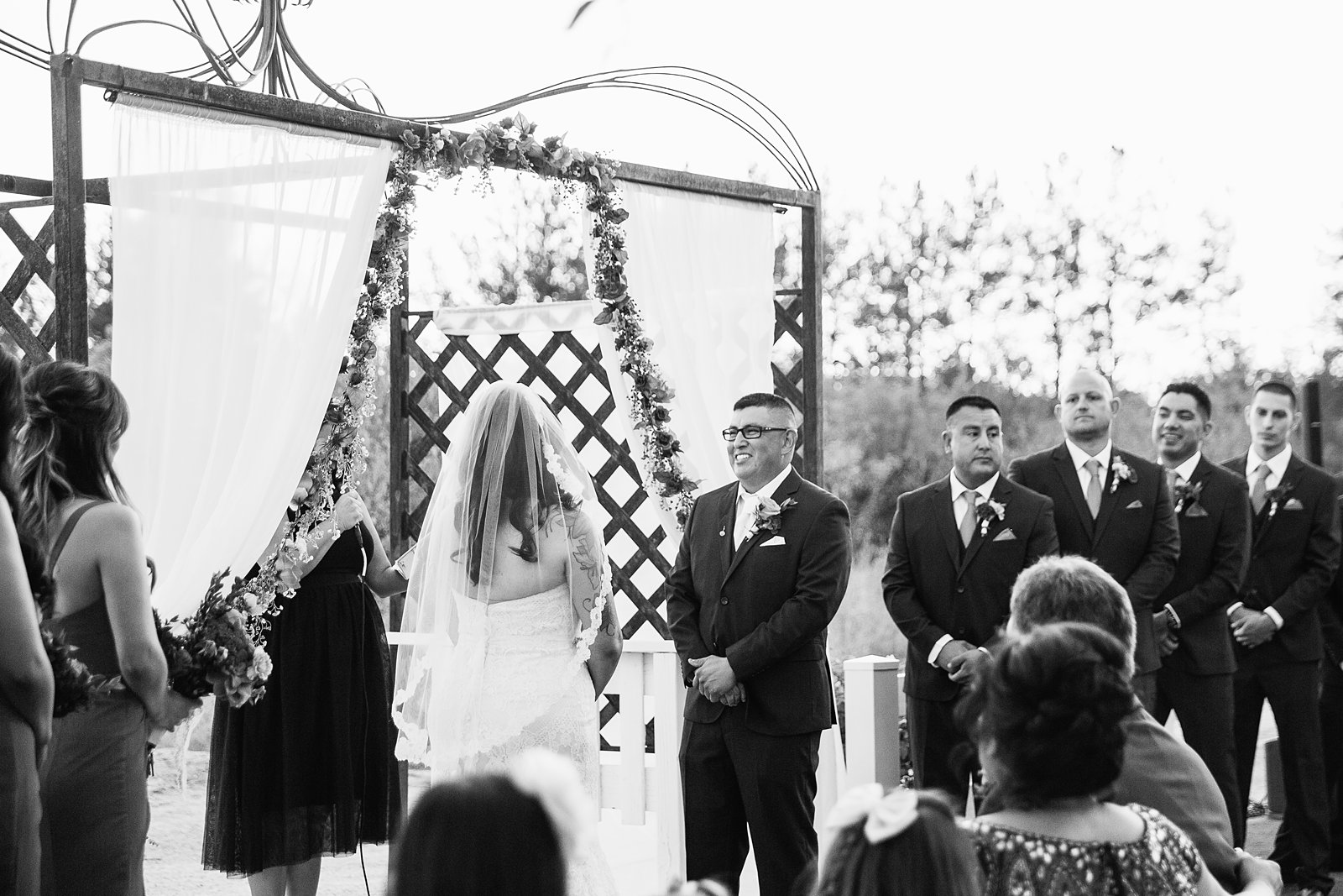 Wedding ceremony at The Farmhouse at Schnepf Farms by Arizona wedding photographer PMA Photography.