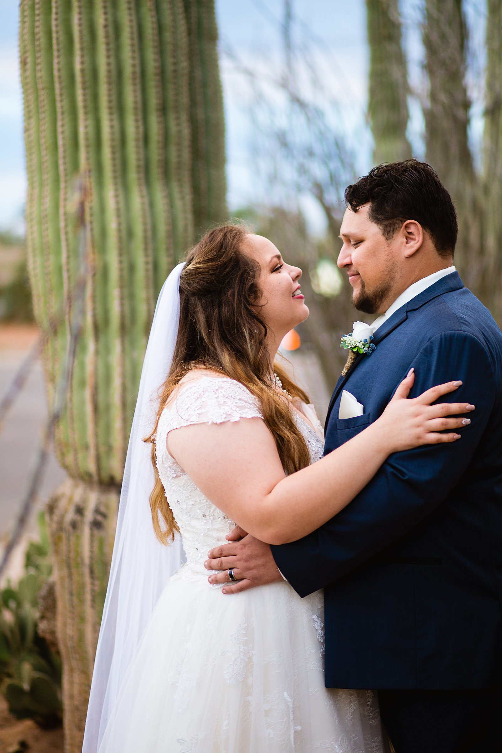 Bride and Groom share an intimate moment at their Backyard wedding by Arizona wedding photographer PMA Photography.