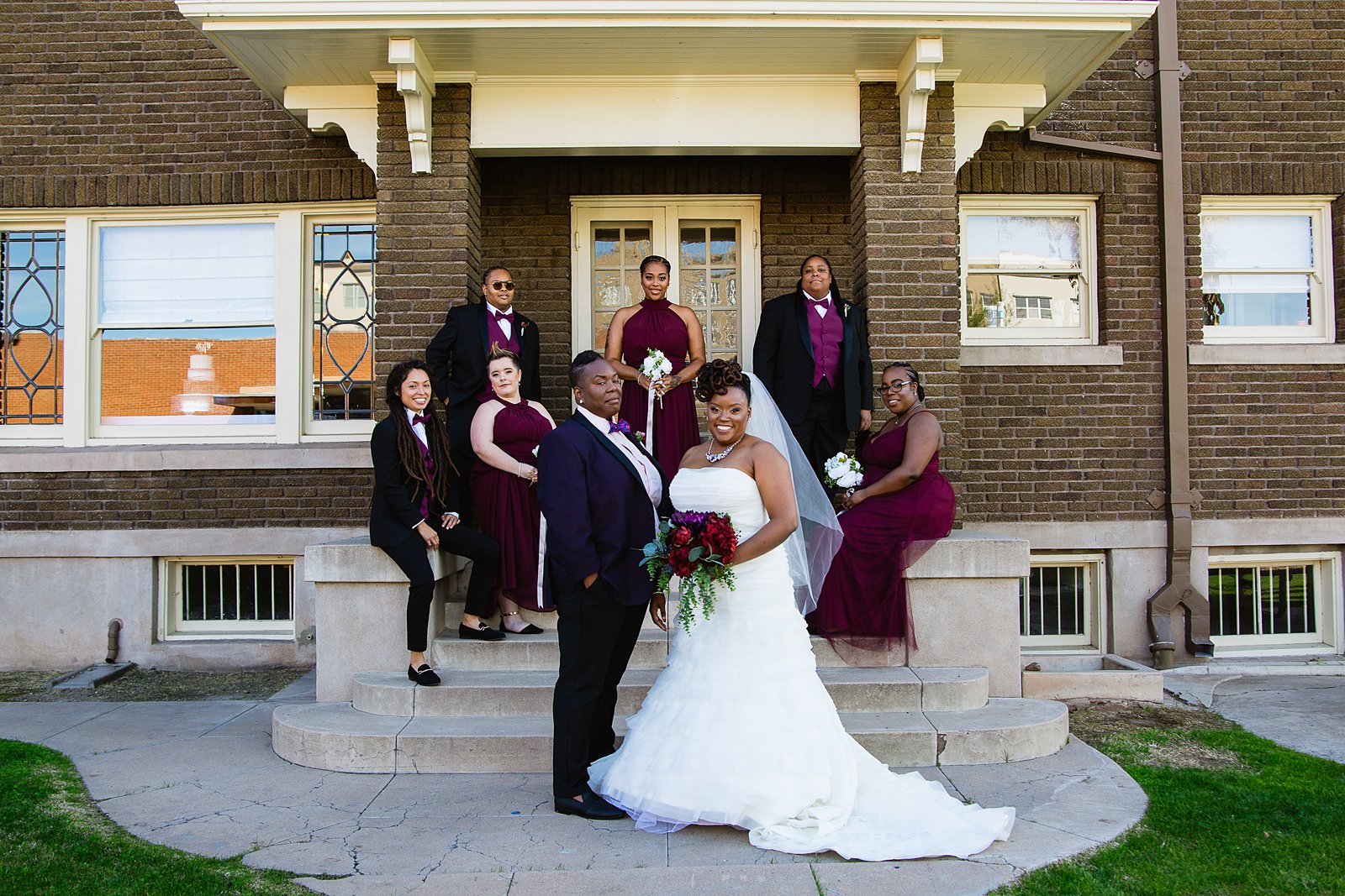 Wedding party together at a Ellis-Shackelford House wedding by Arizona wedding photographer PMA Photography.