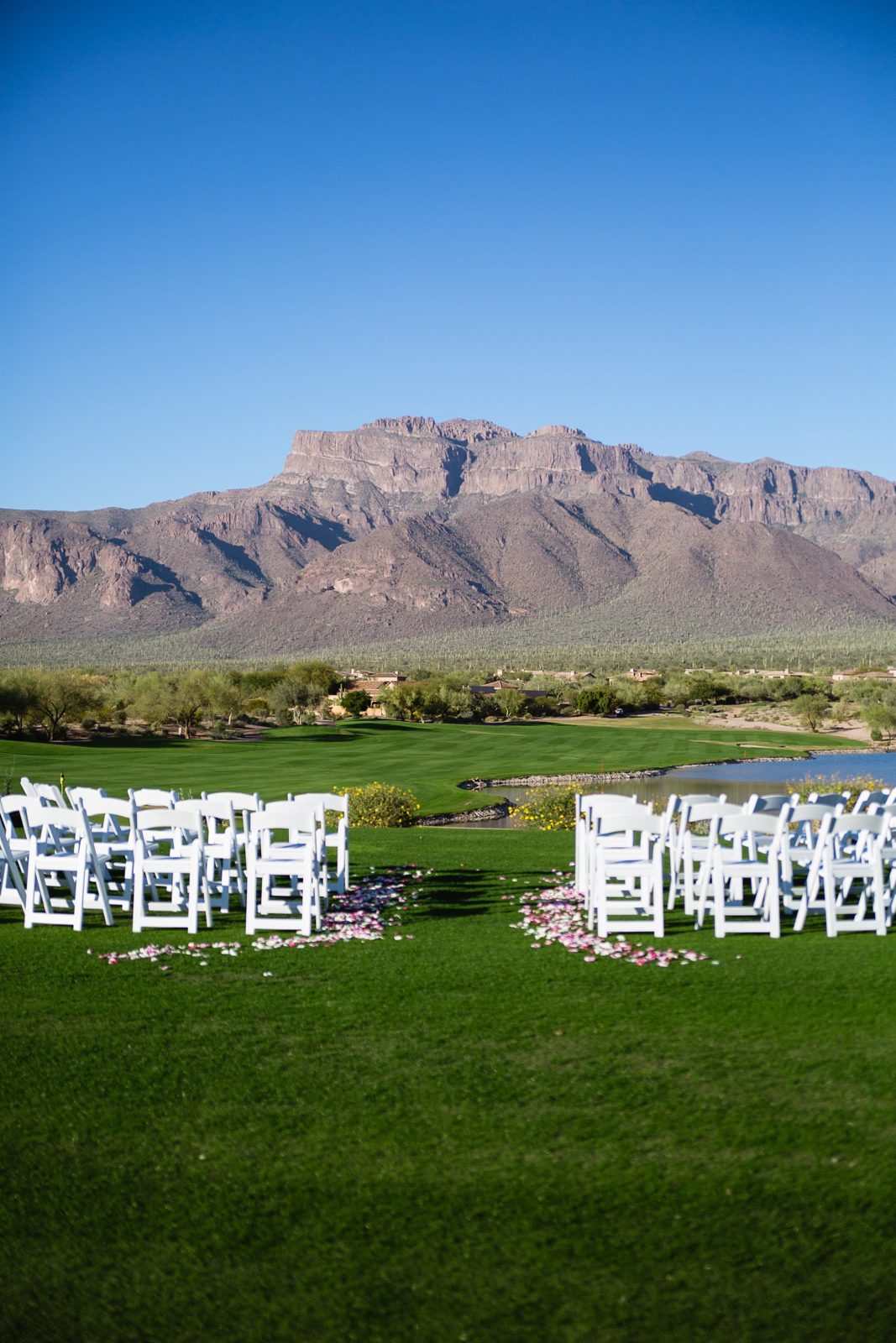 Wedding ceremony at Superstition Mountain Clubhouse by Arizona wedding photographer PMA Photography.