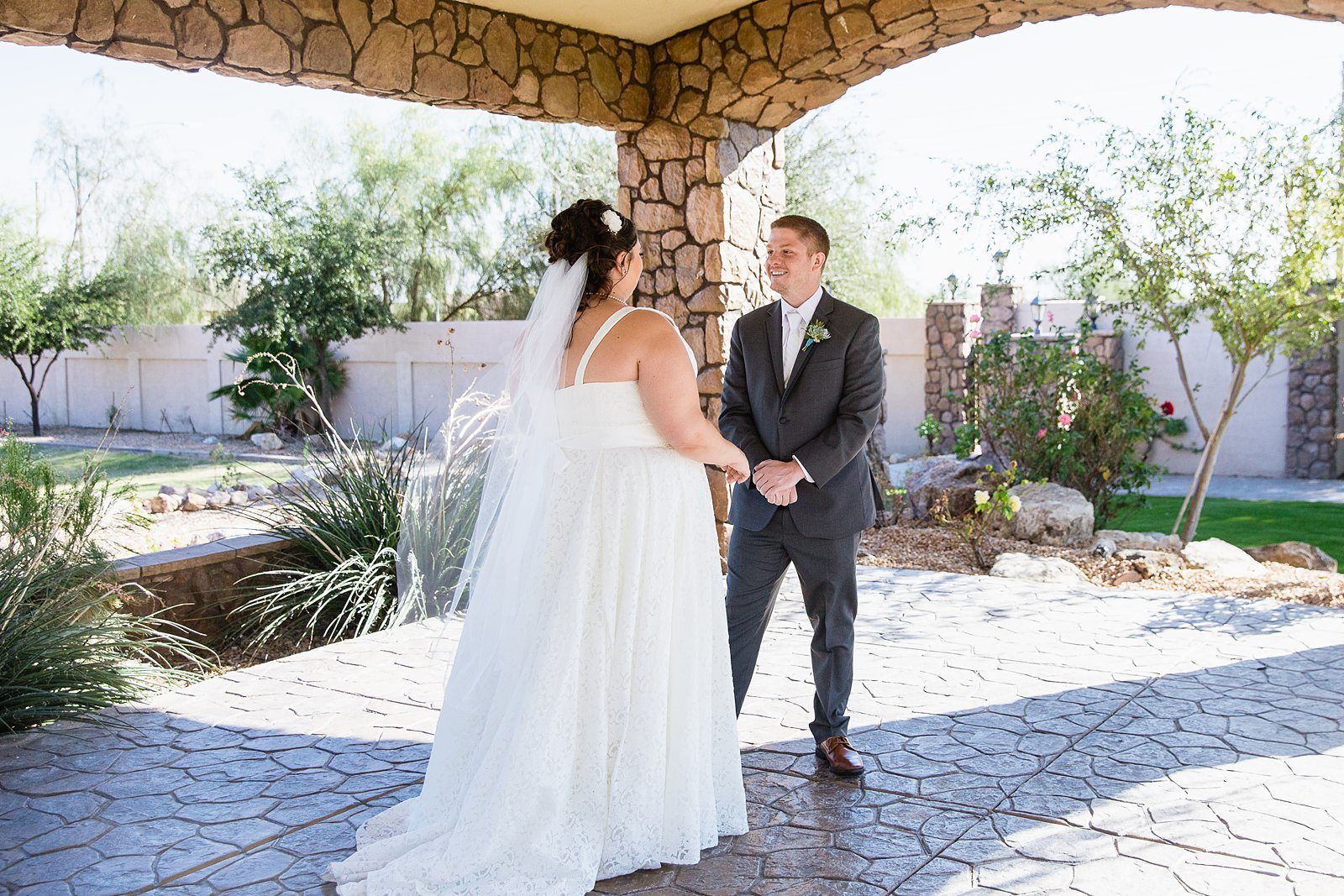 Bride and Groom's first look at Superstition Manor by Arizona wedding photographer PMA Photography.