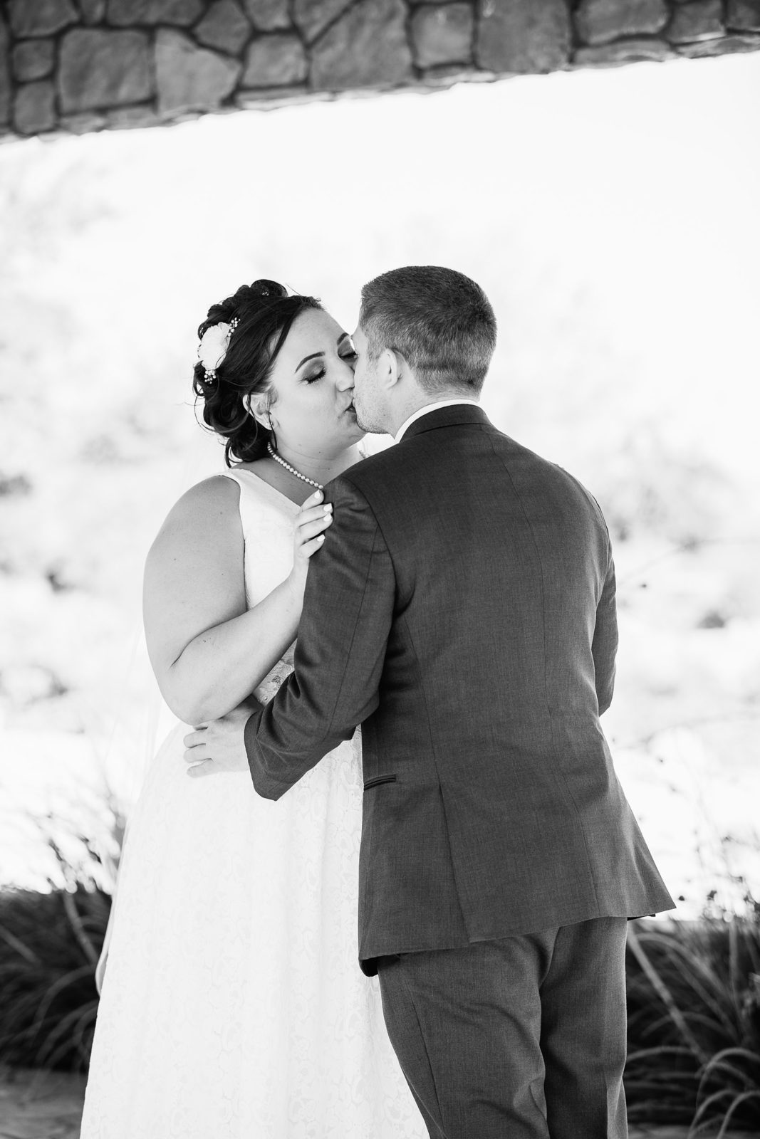 Bride and Groom share an intimate moment during their first look at Superstition Manor by Arizona wedding photographer PMA Photography.