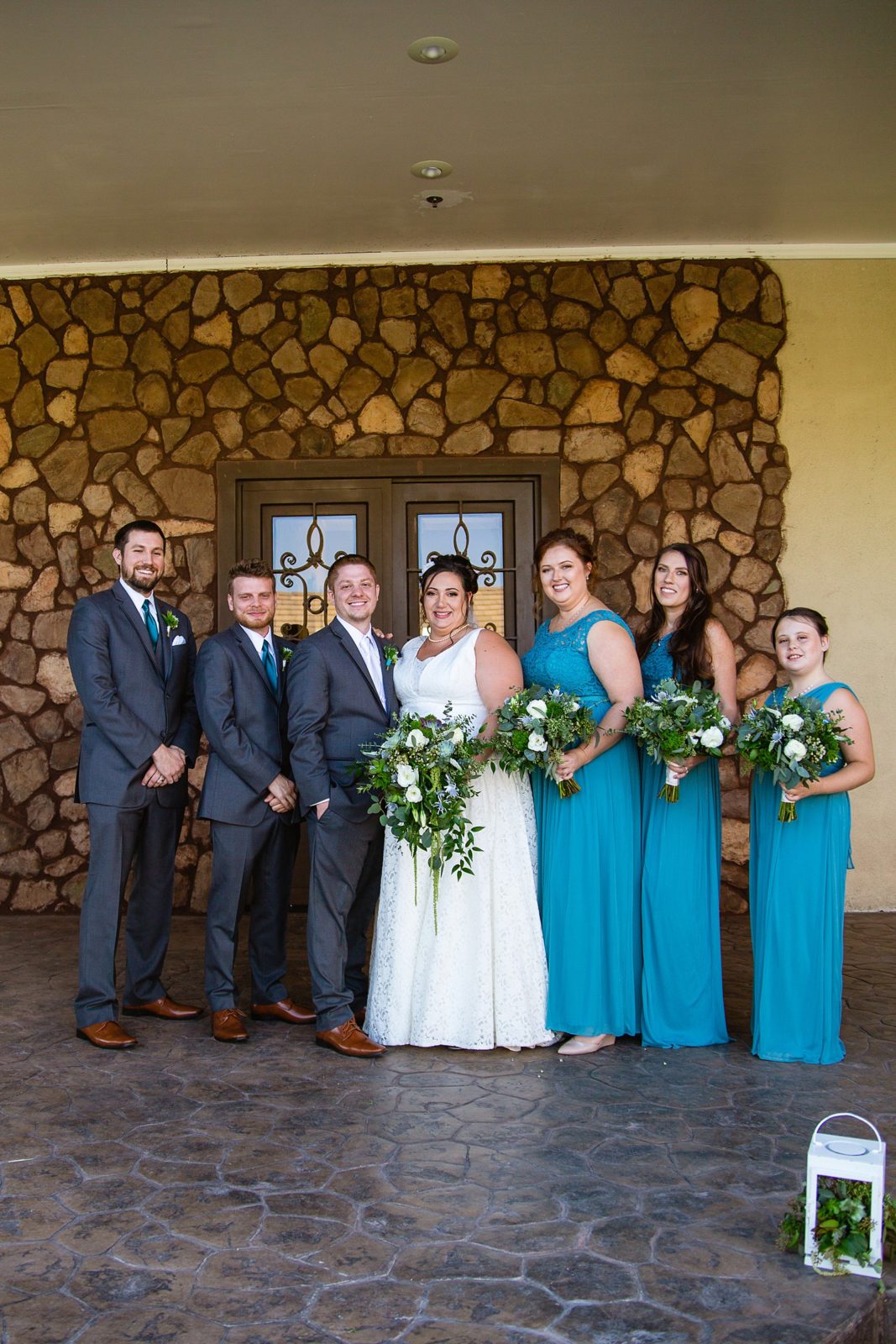 Bridal party together at a Superstition Manor wedding by Arizona wedding photographer PMA Photography.